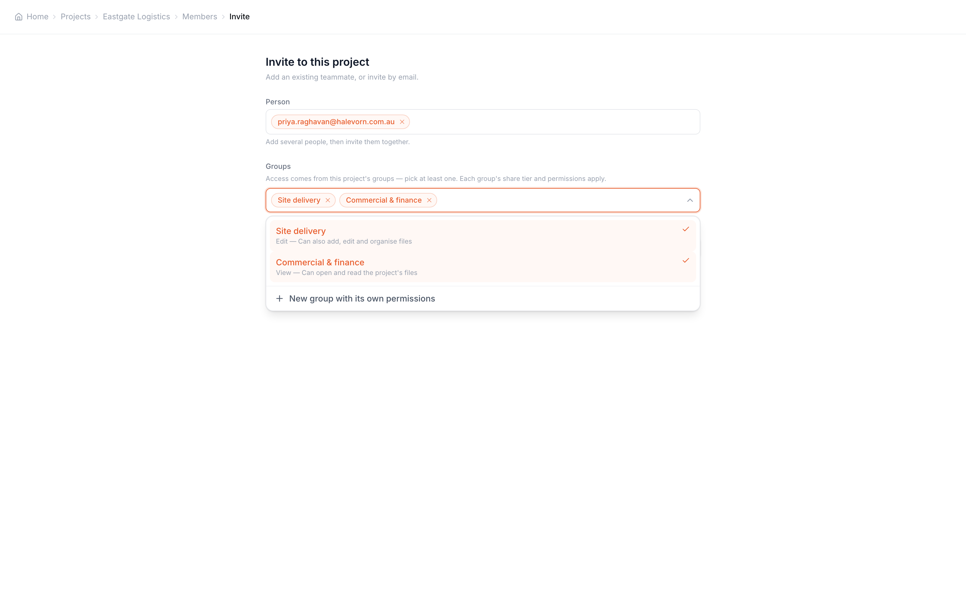The project invite page — one staged recipient chip in the email field, the Groups multi-select open with two groups ticked showing each group's access tier, and the 'New group with its own permissions' option at the foot of the menu.